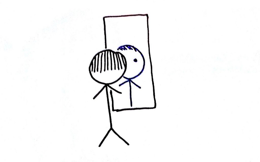 video selfie | a stick person standing in front of a .