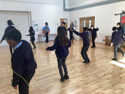 Year 6 skipping in the hall